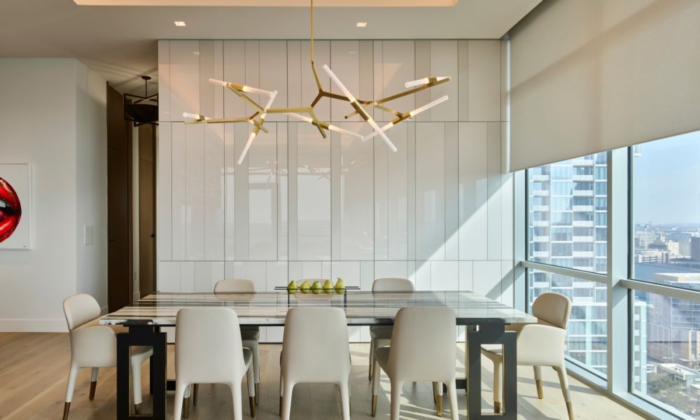 Lutron recessed motorized roller shade in modern dining room