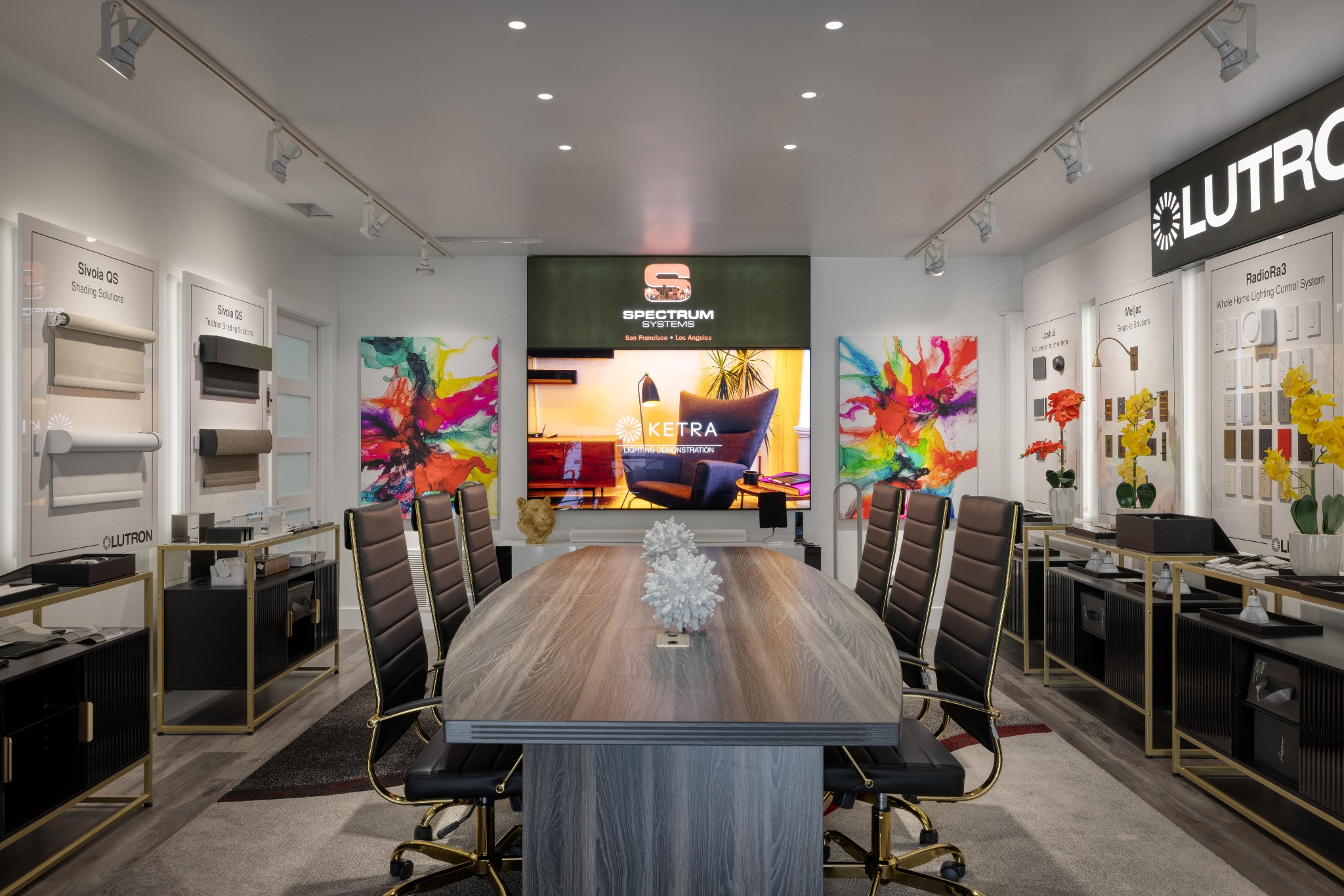 Interior showroom at Spectrum Systems displaying Lutron shades, lighting controls, and Ketra lighting