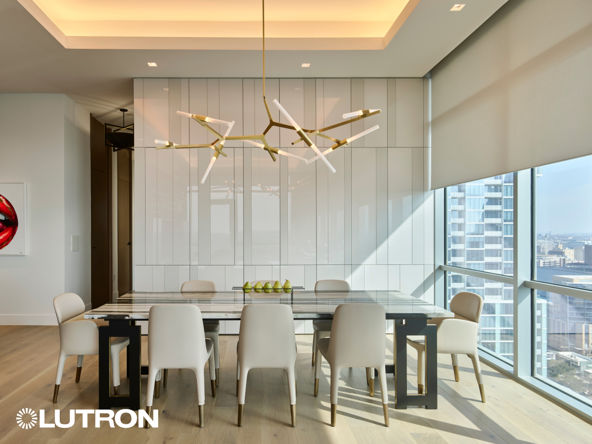 Lutron recessed motorized roller shade in modern dining room